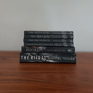 Stack of books (smut novels)